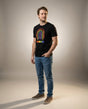 Man wearing the HUMAN Pride tee, full body fashion shot
