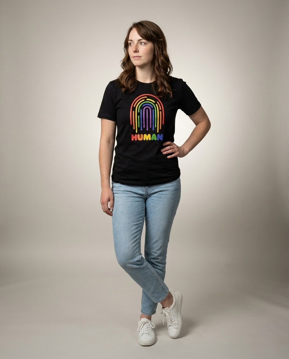 Woman in the HUMAN Pride tee, full-body editorial