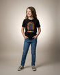 Youth in the HUMAN Pride tee, full-body editorial